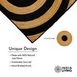 Black rings jute rug in a sunlit room setting