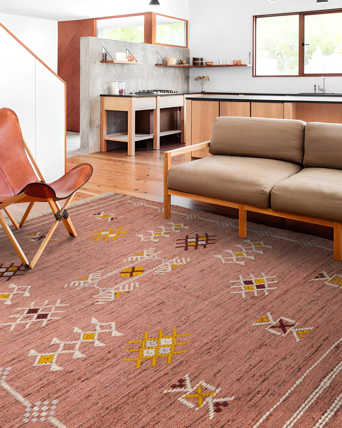 Pink kilim rug in bedroom setting