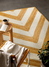 Close-up of natural jute braid texture on white area rug