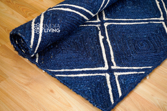Navy jute rug styled in a living room