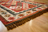 Red kilim rug shown in 8x10 size