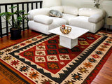 Corner detail of red kilim rug geometric edge