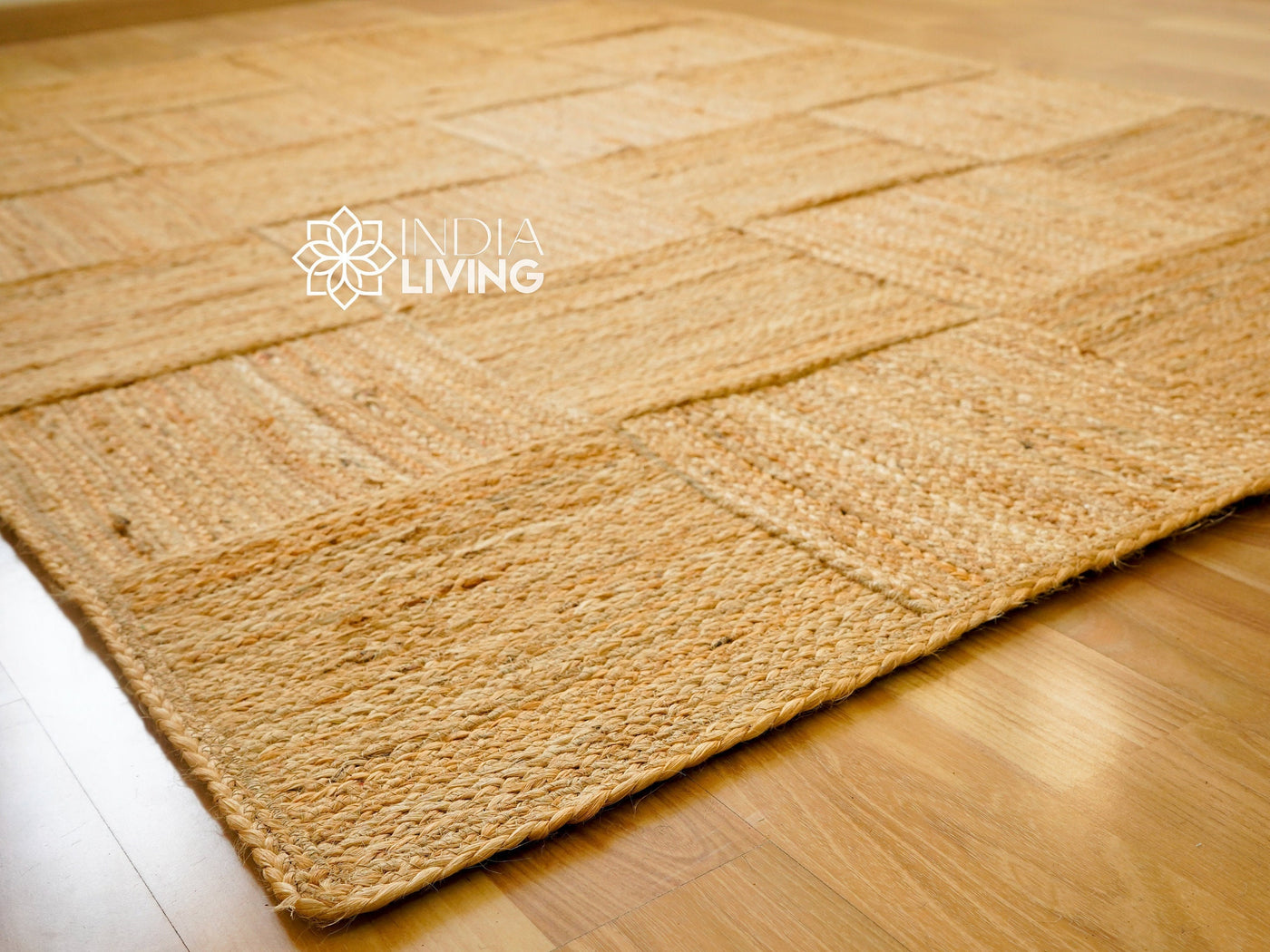 Handwoven jute area rug flat lay showing square pattern
