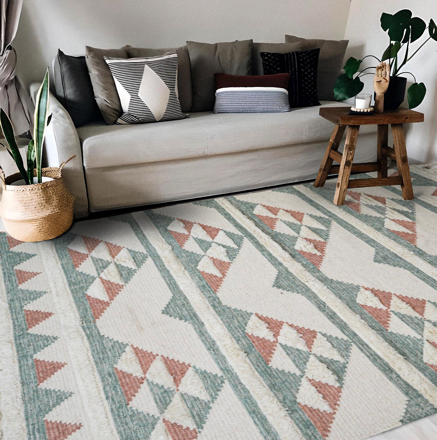 Light pink blue wool kilim rug with abstract design, flat lay