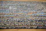 Blue denim rug styled in entryway