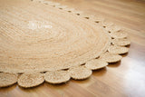 Detail shot of natural fiber braid on jute rug