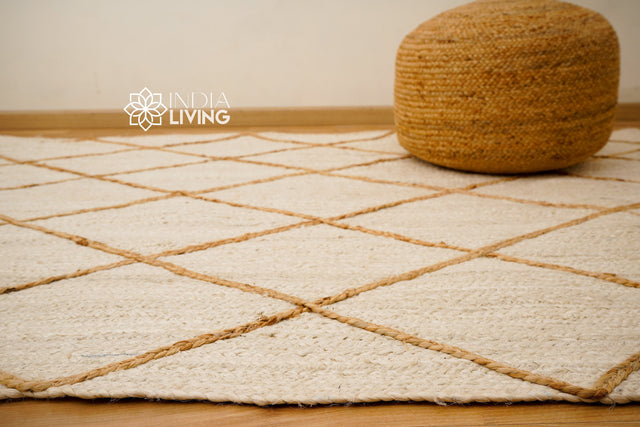 White jute rug styled in bedroom
