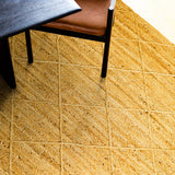 Navy jute rug in entryway setting