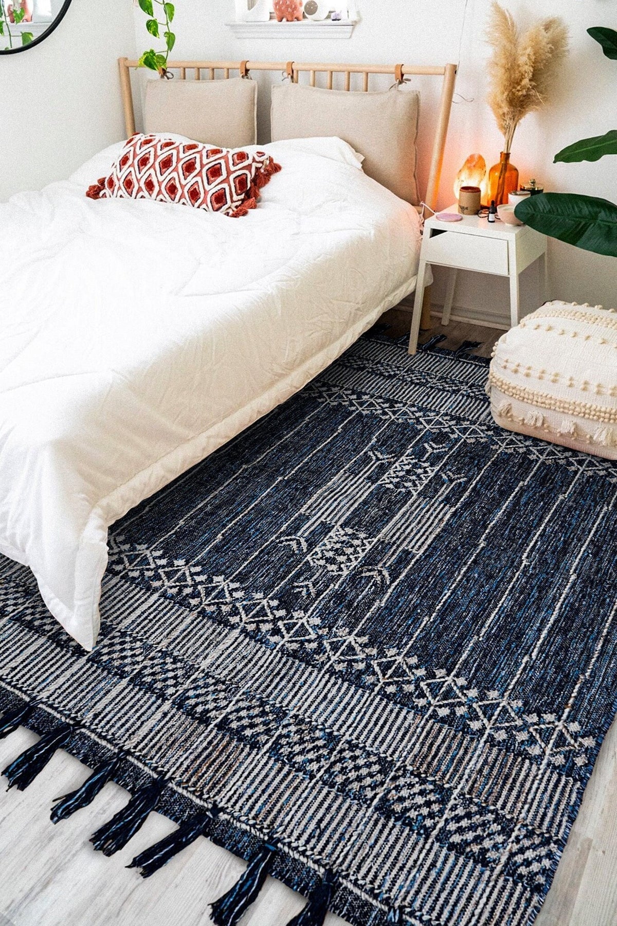 Denim blue kilim rug styled on a patio