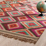 Rainbow rug texture close-up showing wool cotton blend