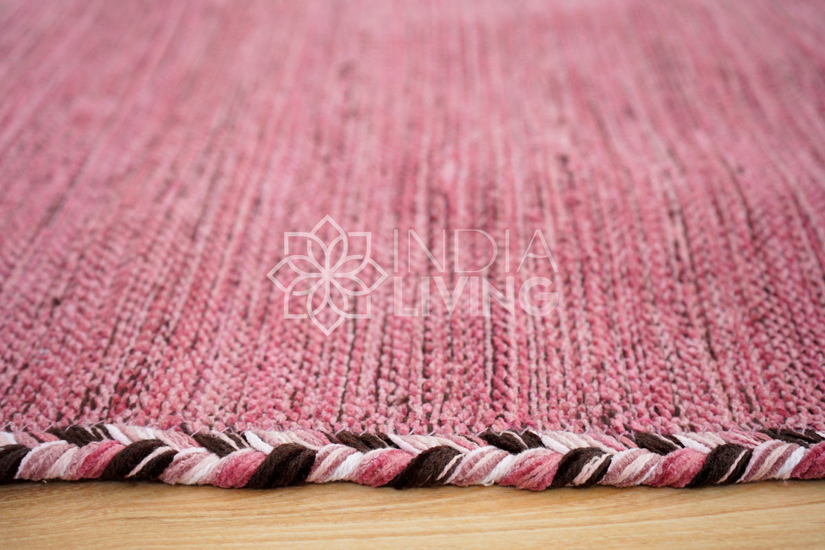 Pink kilim rug in nursery setting