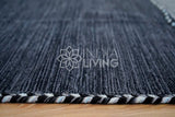 Grey kilim rug styled with matching cushions