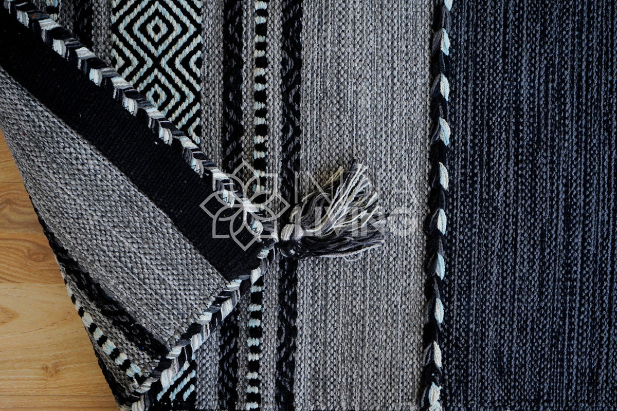 Grey kilim rug in bedroom setting
