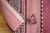 Pink kilim rug pile close-up texture