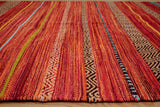Red striped kilim rug pattern close-up
