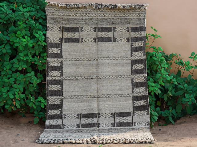 Brown beige geometric farmhouse kilim rug, flat lay view