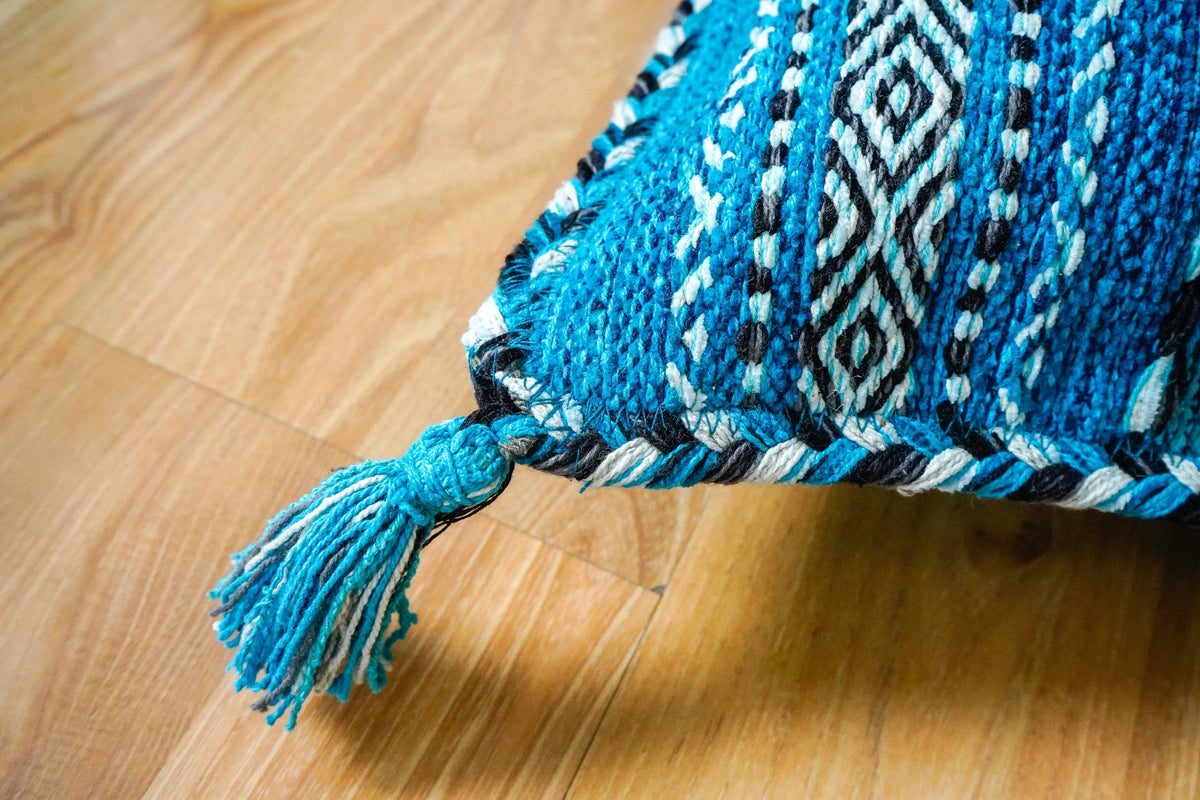 Close-up of light blue chenille weave texture