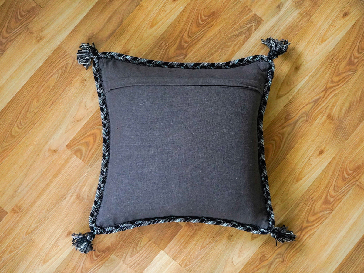 Grey kilim cushion set styled in a living room