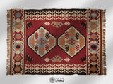 Red kilim rug styled in a living room