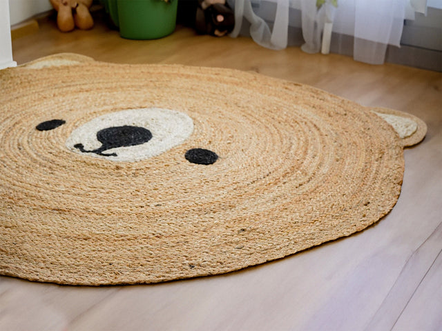 Teddy bear jute round rug flat view showing bear face design