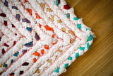Overhead view of multicolor chindi stripe pattern