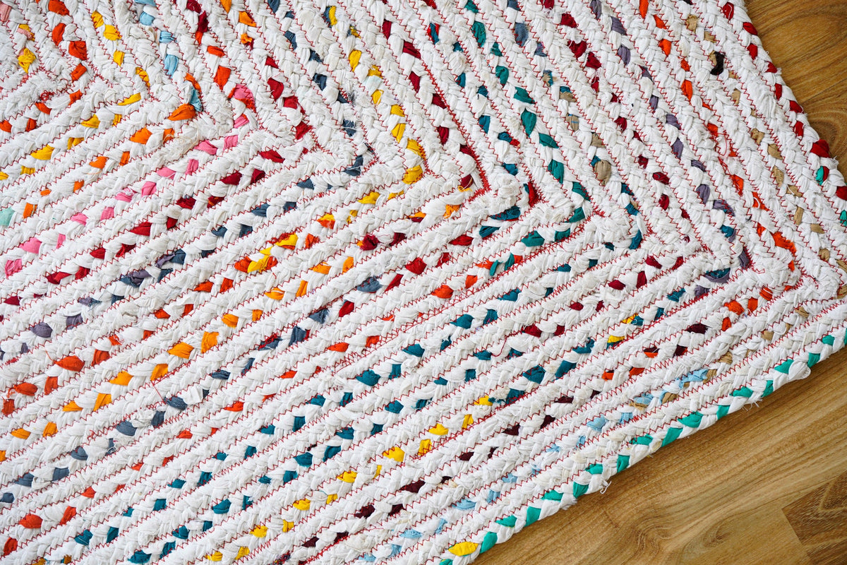Rainbow chindi rag rug styled with colorful home decor