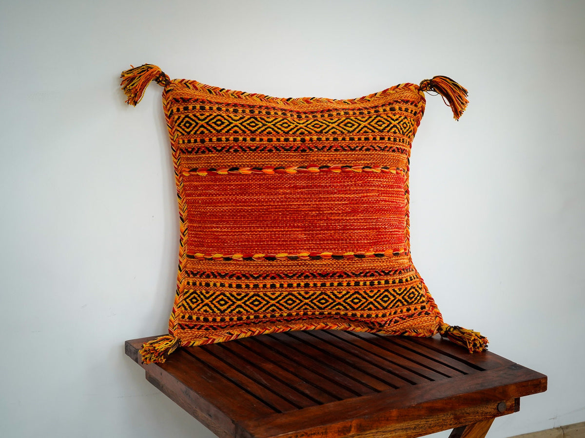 Orange kilim cushion corner detail