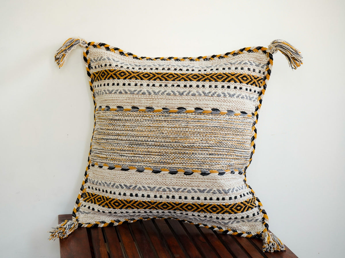 Ivory Moroccan cushion set corner and tassel detail