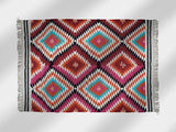 Rainbow kilim rug flat view showing abstract diamond pattern