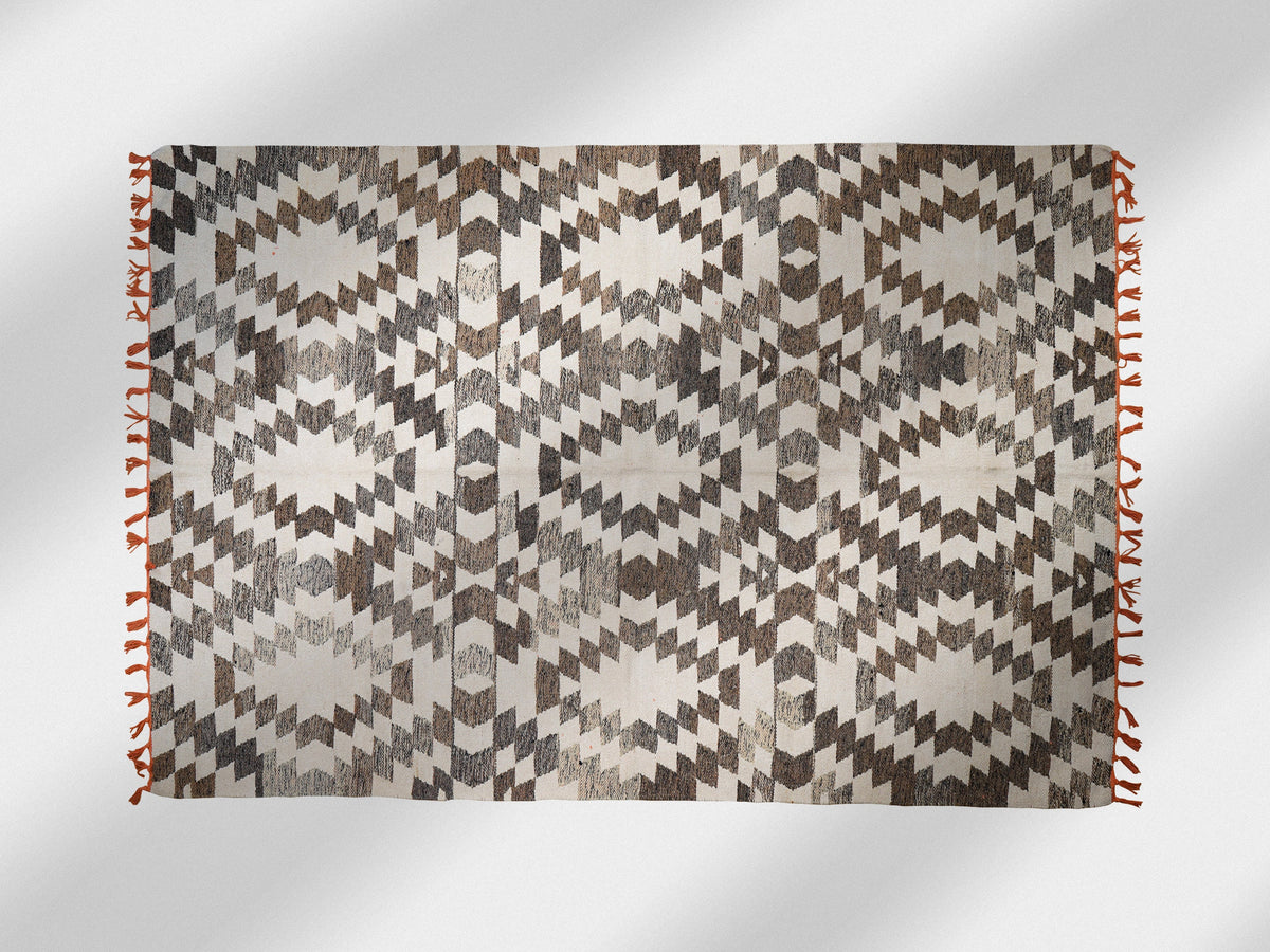 Grey rug fringe edge detail
