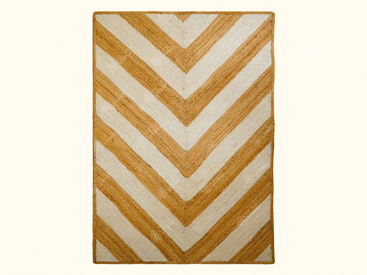 White jute braided rug styled in a bright living room