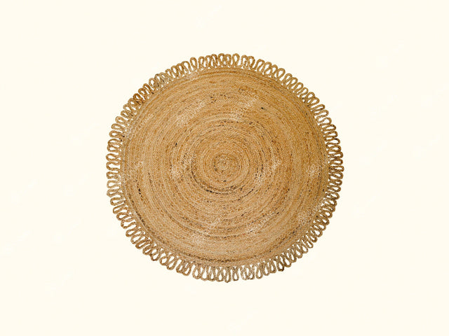 Round jute mat styled in an entryway