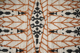 Abstract kilim rug in bedroom setting