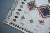 Detail shot of print texture on ivory jute rug