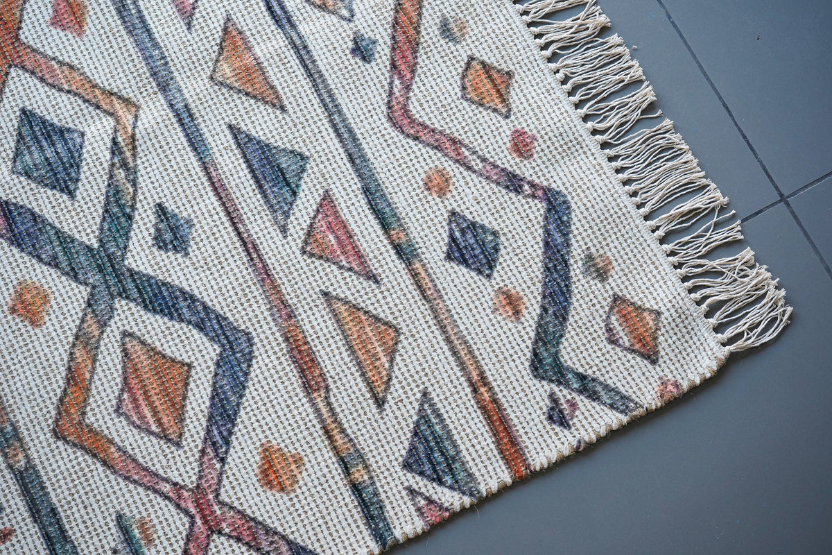 Striped Moroccan ivory rug styled with neutral furniture