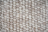 Beige rug corner edge detail
