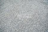 Full flat lay of grey chunky wool rug