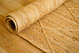 Jute rug styled in an entryway