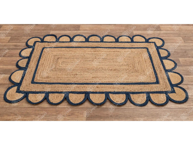 Navy jute rug styled in a bohemian living room