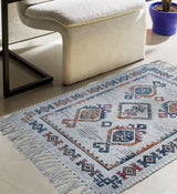 Ivory jute rug placed at a front porch entryway