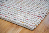 Colorful wool rug in nursery setting