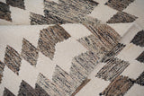 Grey chenille rug styled in living room