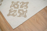 White wool kilim rug corner detail with braided edge