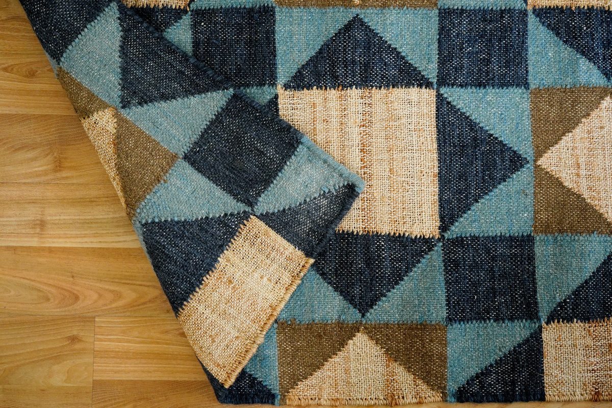 Rug styled with modern minimalist decor accents