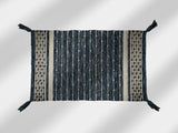 Denim blue kilim rug styled in a living room setting