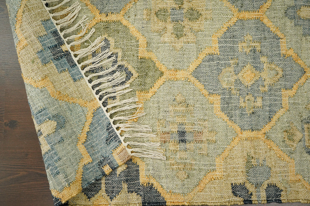 Sage green jute rug in a traditional decor setting