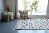 Detail shot of striped print texture on jute rug
