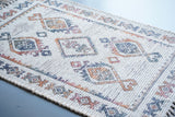 Bohemian ivory jute rug laid flat showing full boho print pattern