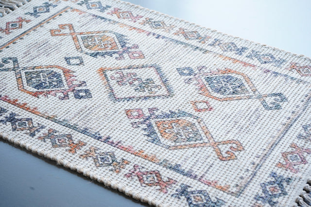 Bohemian ivory jute rug laid flat showing full boho print pattern