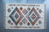 Off white jute rug with matching cushion cover